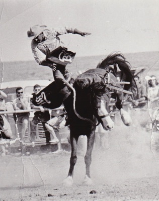 Photograph - Bob Hocking competing in the saddle bronc riding. ; 1963 ...