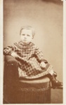 [Studio portrait of a young child on a chair]; F. W. Oliver; ca. 1880; 1977:0031:0091