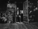 Untitled [Man standing in the doorway of a studio]; Colwell, Larry; ca. 1950s; 1972:0115:0001