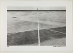 [Figure Stands in a Parking Lot in front of the Sea]; Kuligowski, Eddie; 1973; 1986:0014:0023