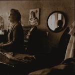 Untitled [Woman behind counter]; Smith, Todd; undated; 1971:0337:0001