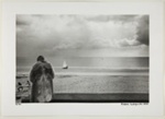 [Woman in Fur Coat Stands Facing the Beach]; Kuligowski, Eddie; 1973; 1986:0014:0007