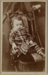 Untitled [Small child with long stripped socks]; L. Horning; 0075:0031:0208