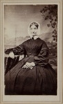[Studio portrait of a seated woman in a bonnet]; Unknown; ca. 1870; 1975:0031:0401