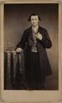 [Studio portrait of a boy standing next to a book]; De Long & Robie; ca. 1870; 1994:0001:0053