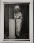 Untitled [Portrait of woman standing next to a pillar]; Daramola Photography Studio; ca. 1960s; 2009:0047:0001