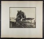 [two men cleaning fish at outdoor bench]; Hahn, Alta Ruth; ca.1930; 1982:0020:0013 