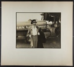 [woman standing near airplane and fuel truck]; Hahn, Alta Ruth; ca.1930; 1982:0020:0023