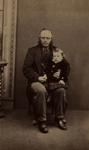 [Studio portrait of an elderly gentleman holding a young child on his lap]; J. Robertson; ca. 1860; 1975:0031:0298