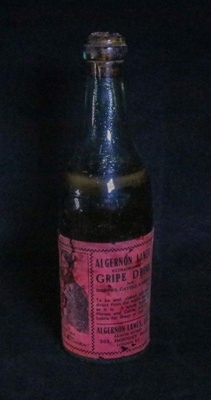 Bottle of Gripe Drink; Algernon Lawes Ltd; c. 1920; STMEA:78.A.47.1.3 Bottle of Gripe Drink; Algernon Lawes Ltd; c. 1920; STMEA:78.A.47.1.3