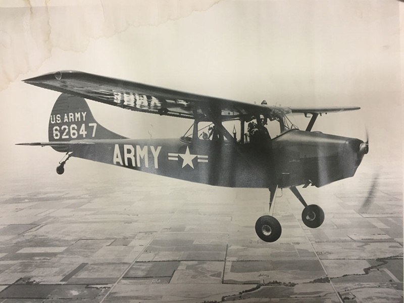 Photograph U.S. Army Cessna O1E (L19) Bird Dog in flight; TAM2017.23 eHive