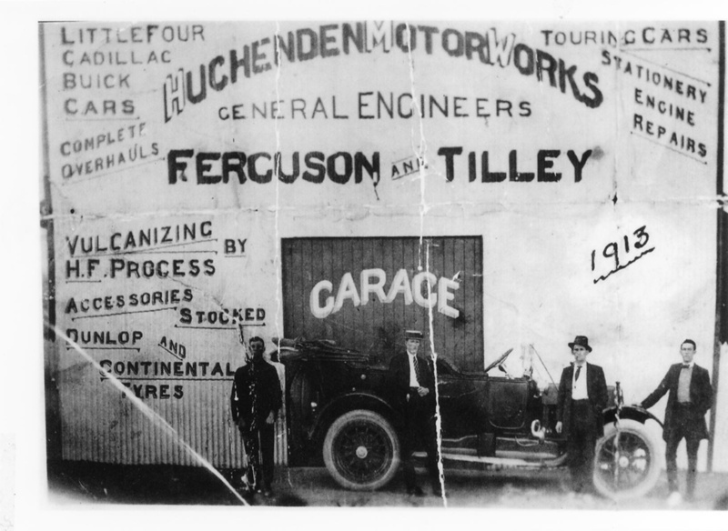 Four men and a motor vehicle outside Ferguson & Tilley Motor Works