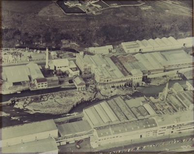Photograph [Mataura Paper Mill and part of the Mataura Freezing Works aerial view]; Southland Aerial Photography; 1962-1976; MT2012.15.13