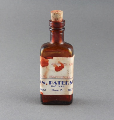 Medicine bottle; a red brown medicine bottle with ...