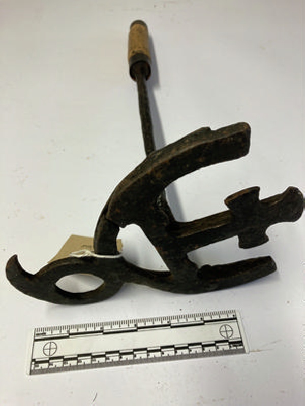 Cattle branding iron, Q under crown, wooden handle. This is the mark ...