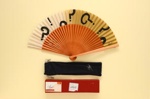Folding Fan, Pochette & Box; 1990; LDFAN2011.34.A, LDFAN2011.34.B & LDFAN2011.34.C
