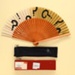 Folding Fan, Pochette & Box; 1990; LDFAN2011.34.A, LDFAN2011.34.B & LDFAN2011.34.C