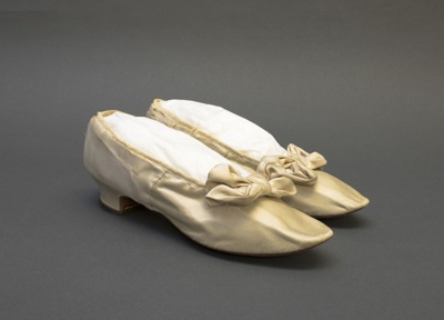 Silk satin shoes, decorated with bow; c. 1890; LDFAN2019.19 A&B