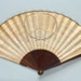 Wooden folding fan with printed paper leaf - Fanology 1797; LDFAN2014.162