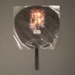Fixed fan advertising 'Star Wars' inside its original clear plastic wrapper; 20th century; LDFAN2021.1