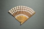 Wooden  folding fan with fabric leaf; c. 1960; LDFAN2023.37