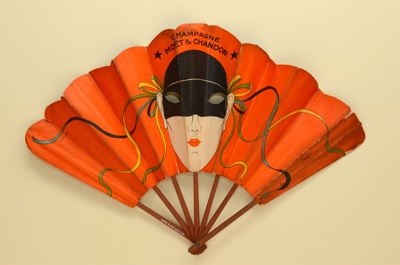 Advertising 'mask' fan for Moet & Chandon champagne ; Ganné, J; c.1930; LDFAN2003.423.HA