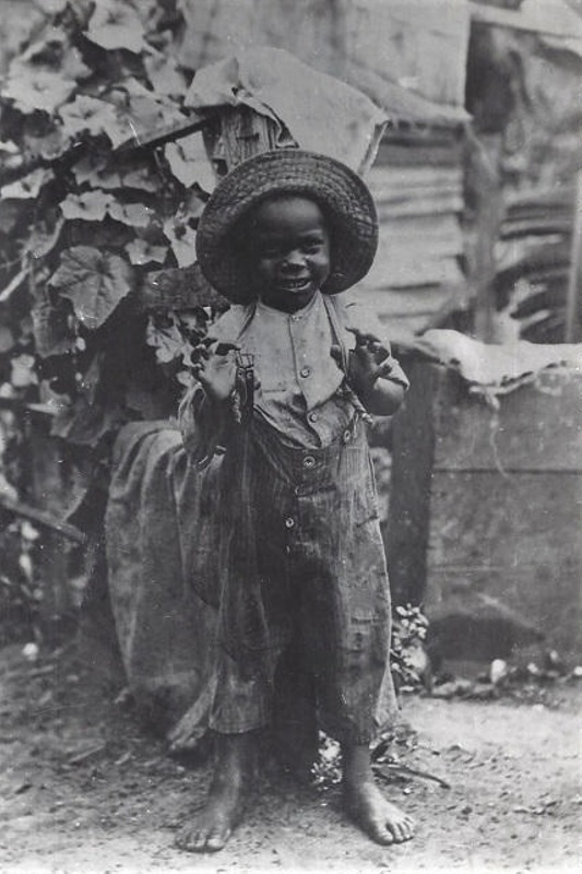 Photograph of a boy, the child born of an Australian Aboriginal Mother ...