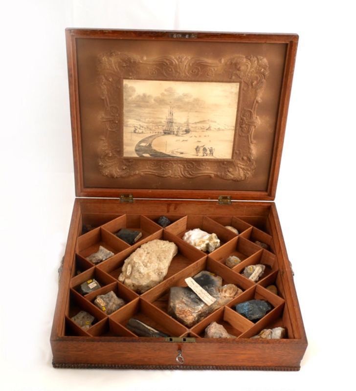 Wooden specimen case with geological samples. ; On the search for North