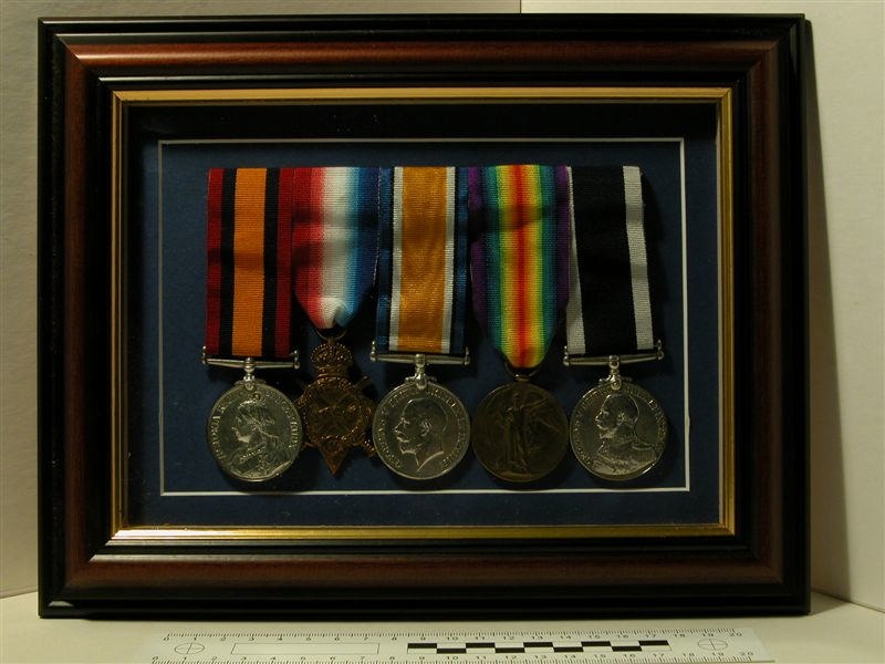 Flamed display of 5 medals awarded to Thomas Colwil (Boer War medal; 3 ...