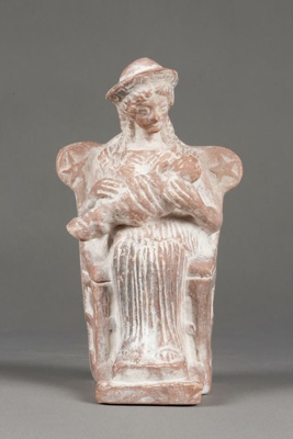 Clay Figure of a seated woman holding a child.; CC17