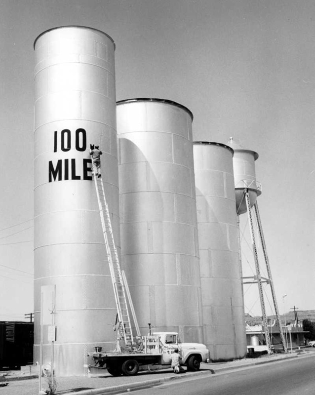 Painting water tanks.; 1302 eHive