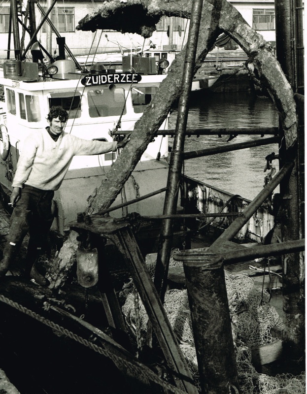 Photograph 'Old anchor trawled up by small boat'; Graystone, Ernest ...