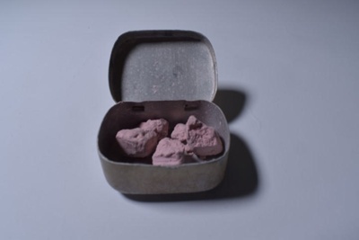 Tin containing nail polishing stones; Unknown; SH1981-1836