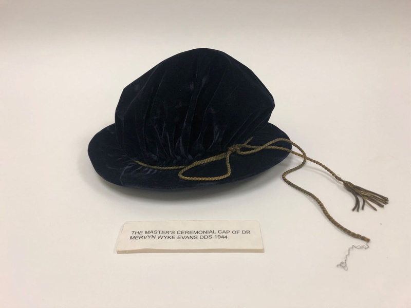 Uniform Academic Hoods and Belonging to Dr Mervyn Evans; Ca