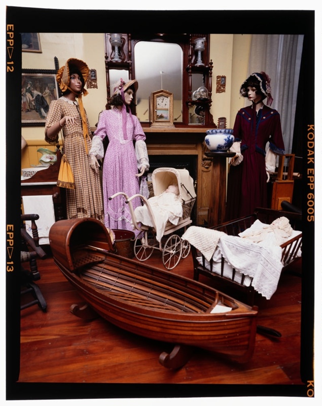 Display of cradles and women's clothing in the old Lyttelton Museum