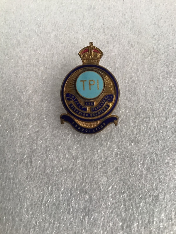 Tpi totally and permanently disabled soldiers association badge navy
