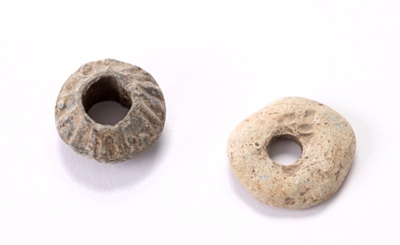 2 spindle wholes; CRMCH.1998.04