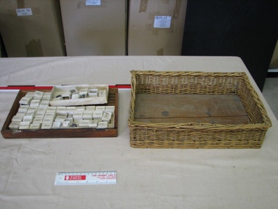 Mineral collection in wooden tray - individual mineral specimens in basket tray; 08-3739