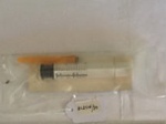 Sterile single use syringe in plastic sleeve; Johnson & Johnson; c1950's; BC2015/30