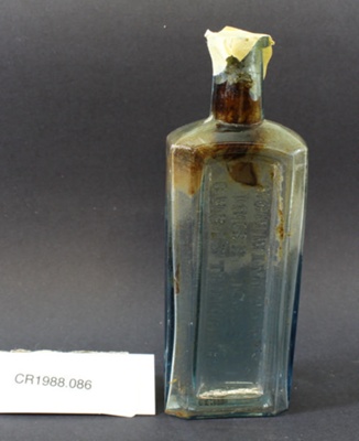 Glass bottle, previously held Bonnington's Irish Moss cough medicine; Unknown; Unknown; CR1988.086