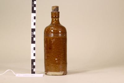 Stoneware ink bottle and cork; Encre Japonaise Antoine & Fils; c.1800; CR1977.091