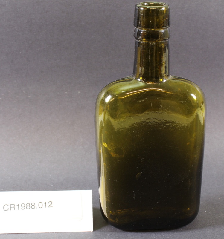 Smoky green glass whiskey flask/bottle; CR1988.012 eHive