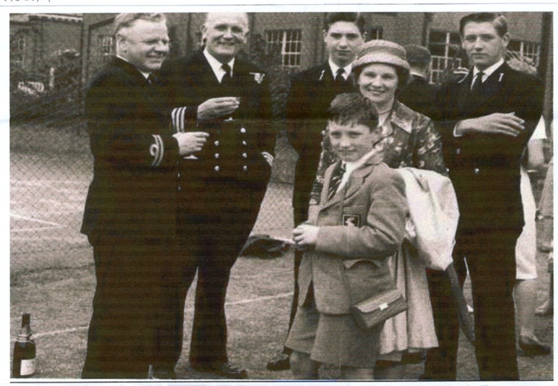 Photograph of Commander William Messinger (2nd left) circa 1960. He had