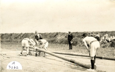 Photograph of boys rigging sheer legs on the lower sports field at HMS ...