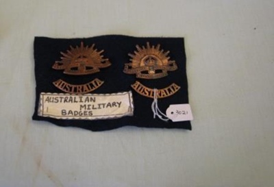 Badge - Hat badges - rising sun x 2
; SH1968-3021