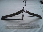 Coat hanger - folding - black  wire and t ape one branded C Curran Orange
; SH1968-3056