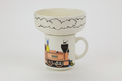 Nurseryware Tootle train patterned mug and bowl; Juliet Hawkins; Crown Lynn Potteries Ltd; circa 1980; 02364.1-.2 