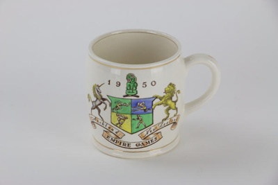 1950 Empire Games souvenir mug; David Jenkins; Crown Lynn Potteries Ltd; Doris Bird; Ernest (Ernie) Shufflebotham; 1950; 00176