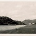 Photo, Beach with bridge and hills in distance; RAP2020.0073