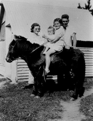 Photo, Ollie and Chris Ordish with their two children on a horse; 2005/224.79